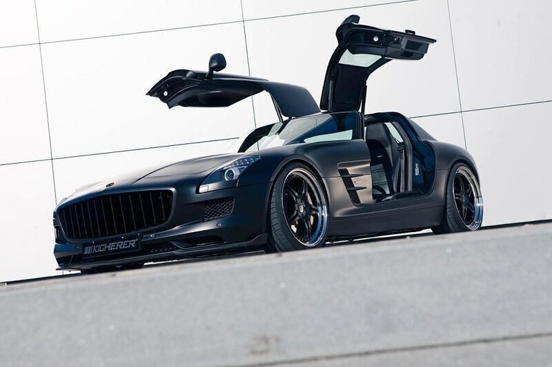 Black sports car with open doors