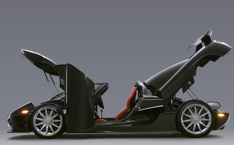 black sports car with open doors