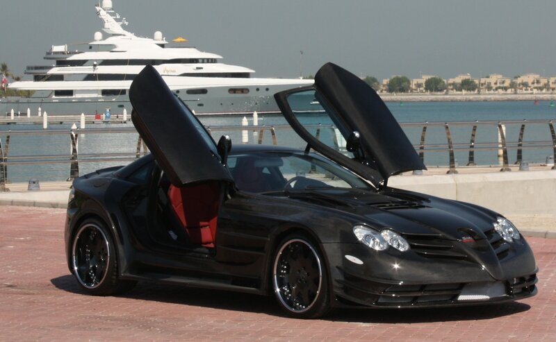 Black sports car with open doors