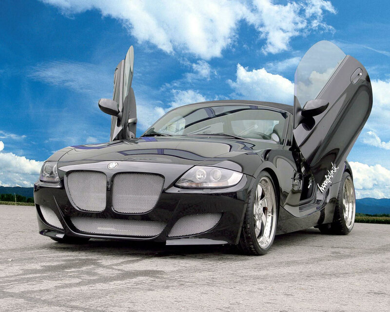 Black sports car with open doors
