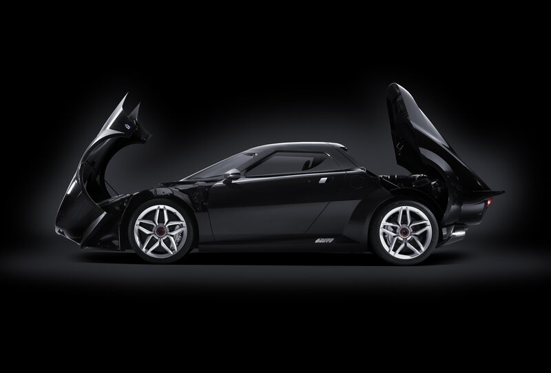 Black sports car with open doors