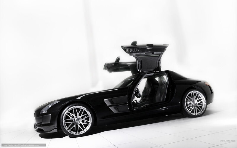 Black sports car with open doors