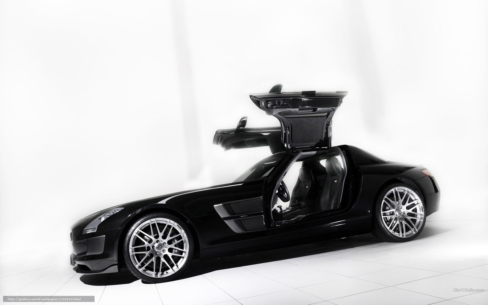 Black sports car with open doors