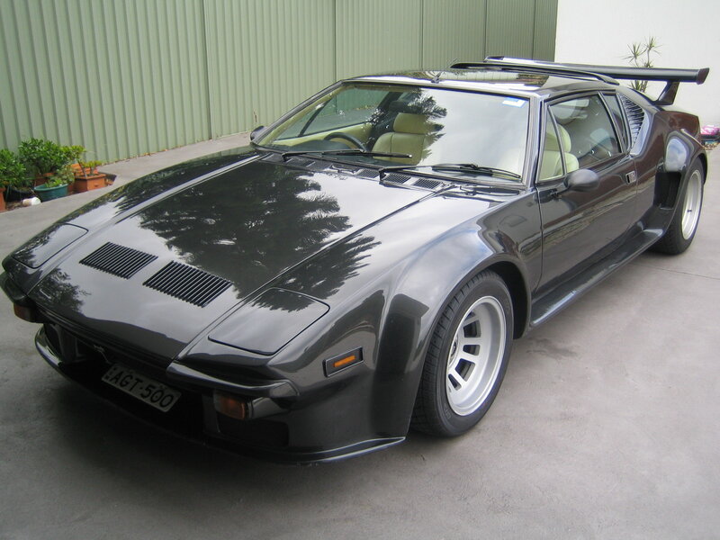 Black sports car with rear wing