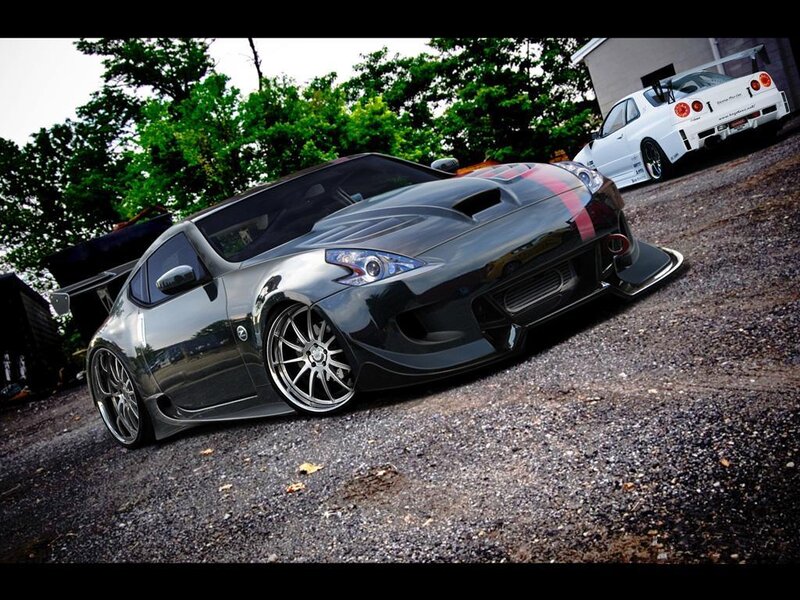 black sports car with red stripes