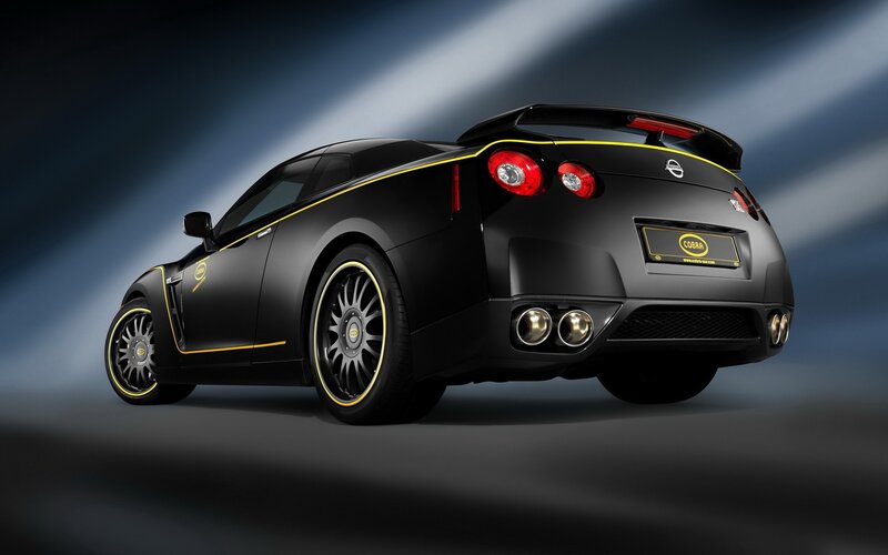 black sports car with yellow accents