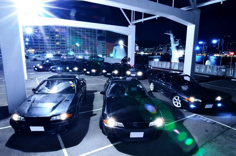 Black Sports Cars at Night — Dramatic