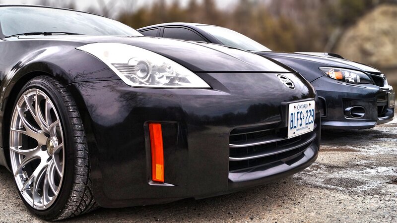 Black sports cars parked