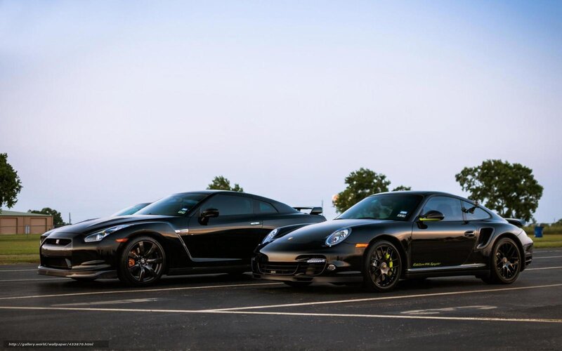 Black sports cars parked together