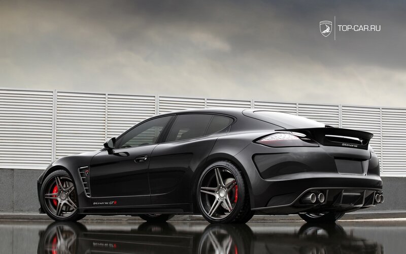 Black sports sedan with custom wheels