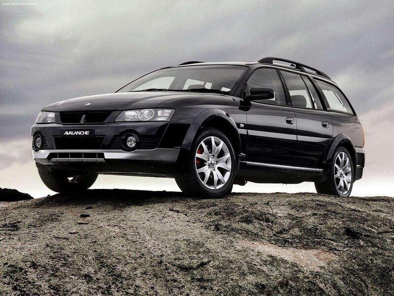 Black Station Wagon — Dramatic, Photograph, Rocks