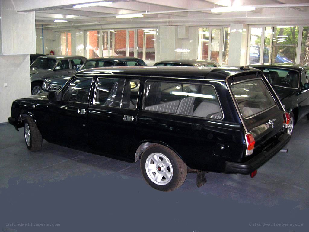 Black station wagon in garage
