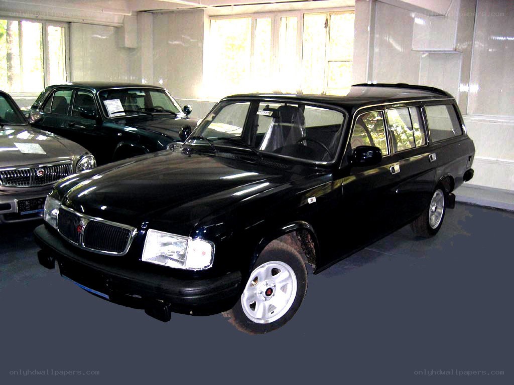 black station wagon in showroom