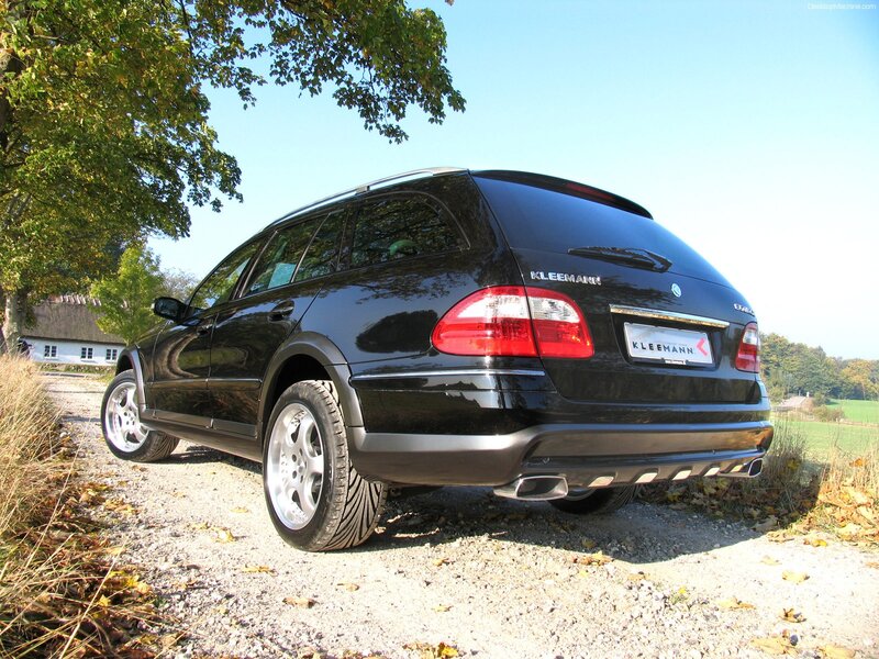 black station wagon on gravel