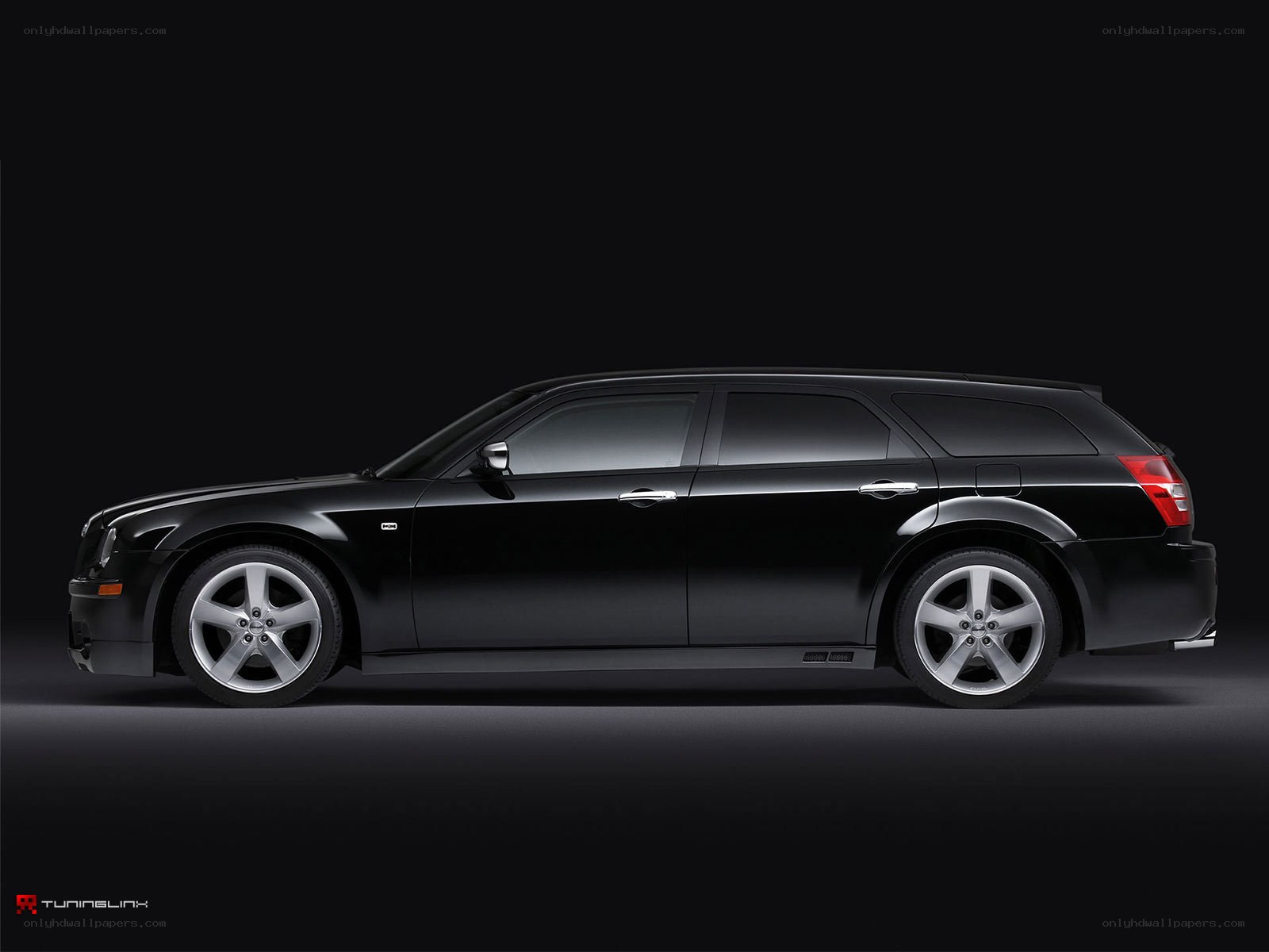 black station wagon side profile