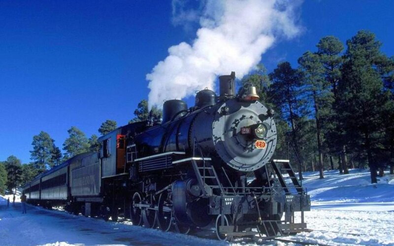 Black Steam Train in Snow