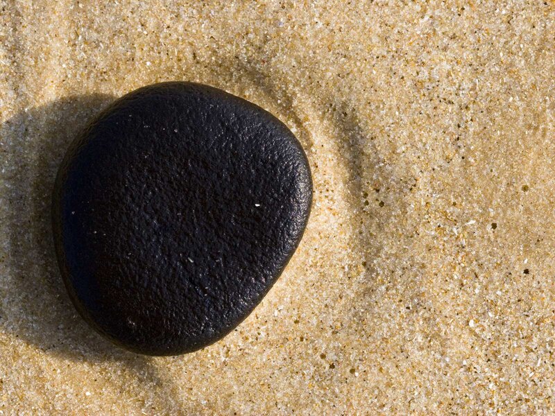 Black Stone on Sand — Calm