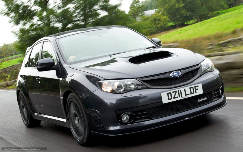 black subaru in motion