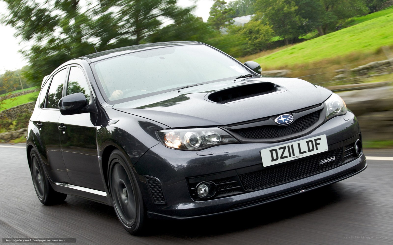 black subaru in motion