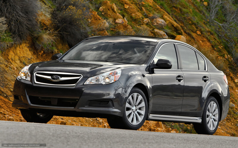 Black Subaru Legacy on a road