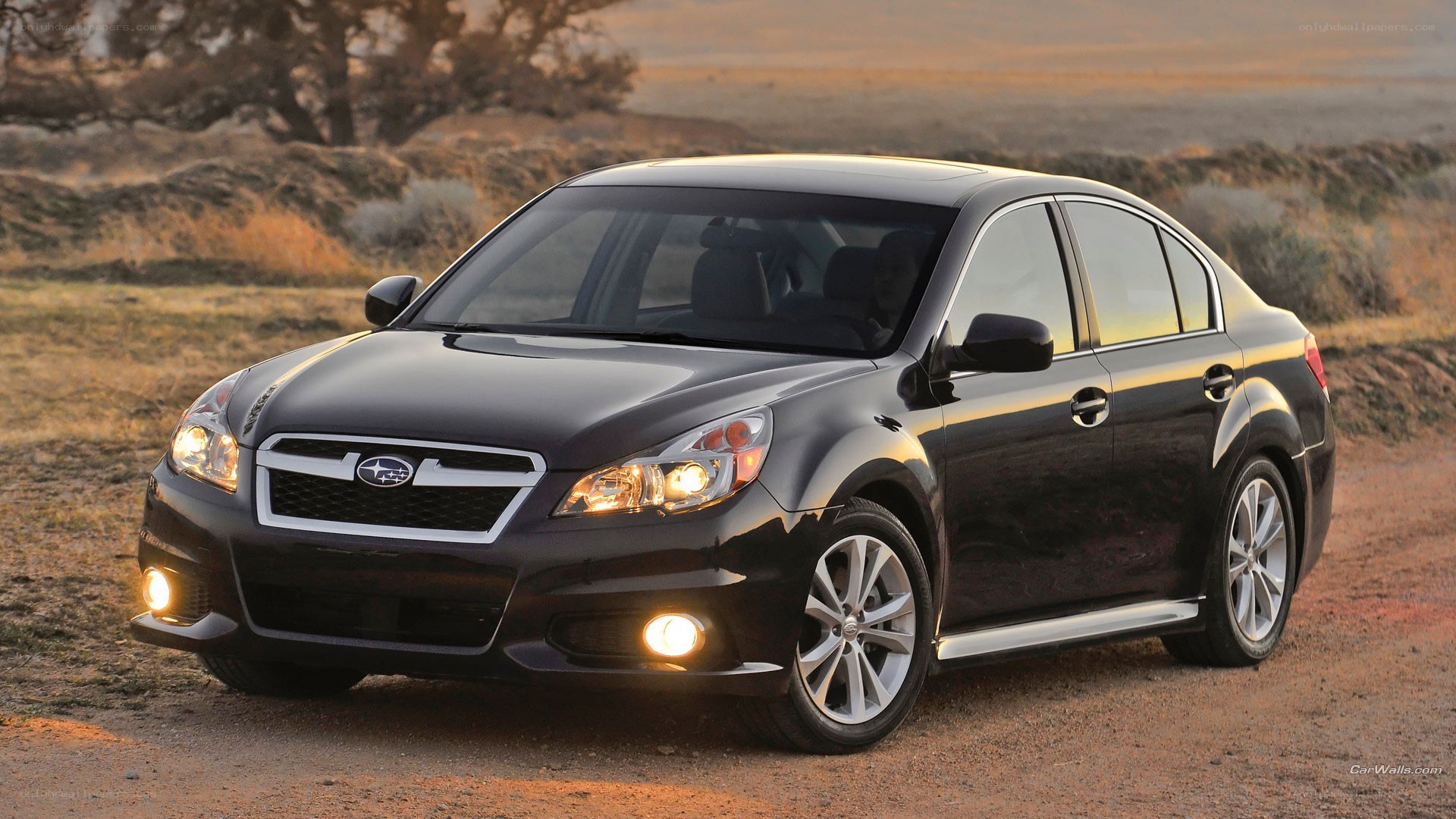 black subaru legacy sedan