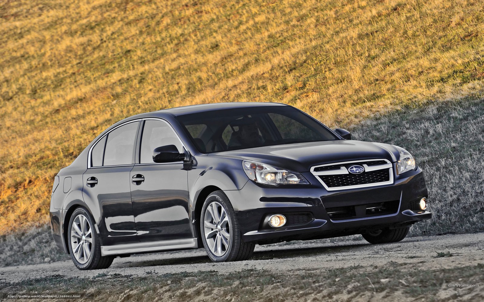black subaru legacy sedan