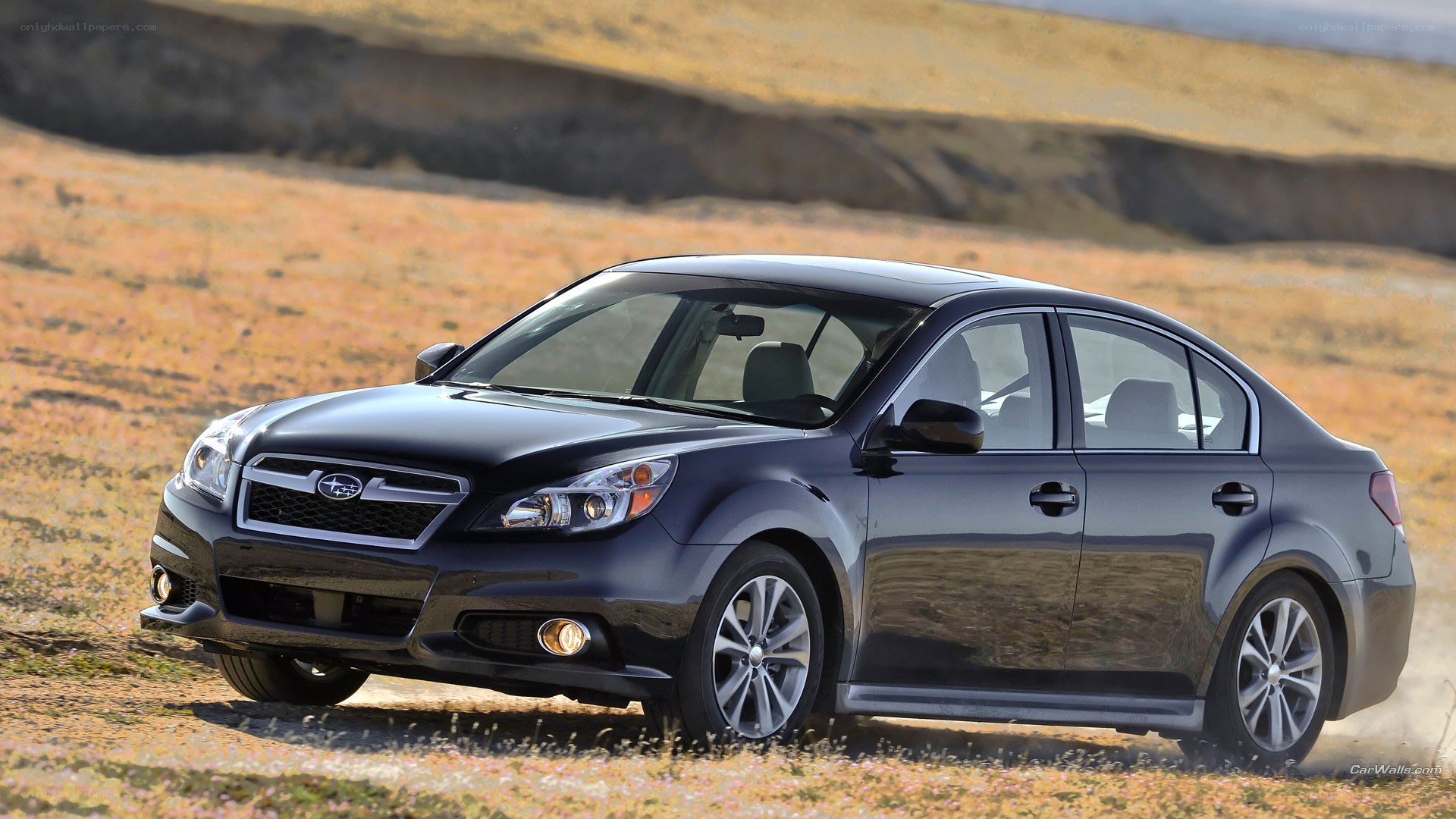 black subaru legacy sedan