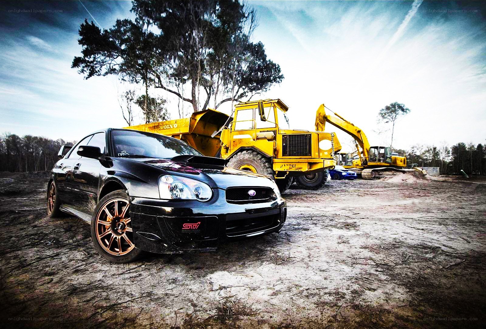 Black Subaru on a construction site