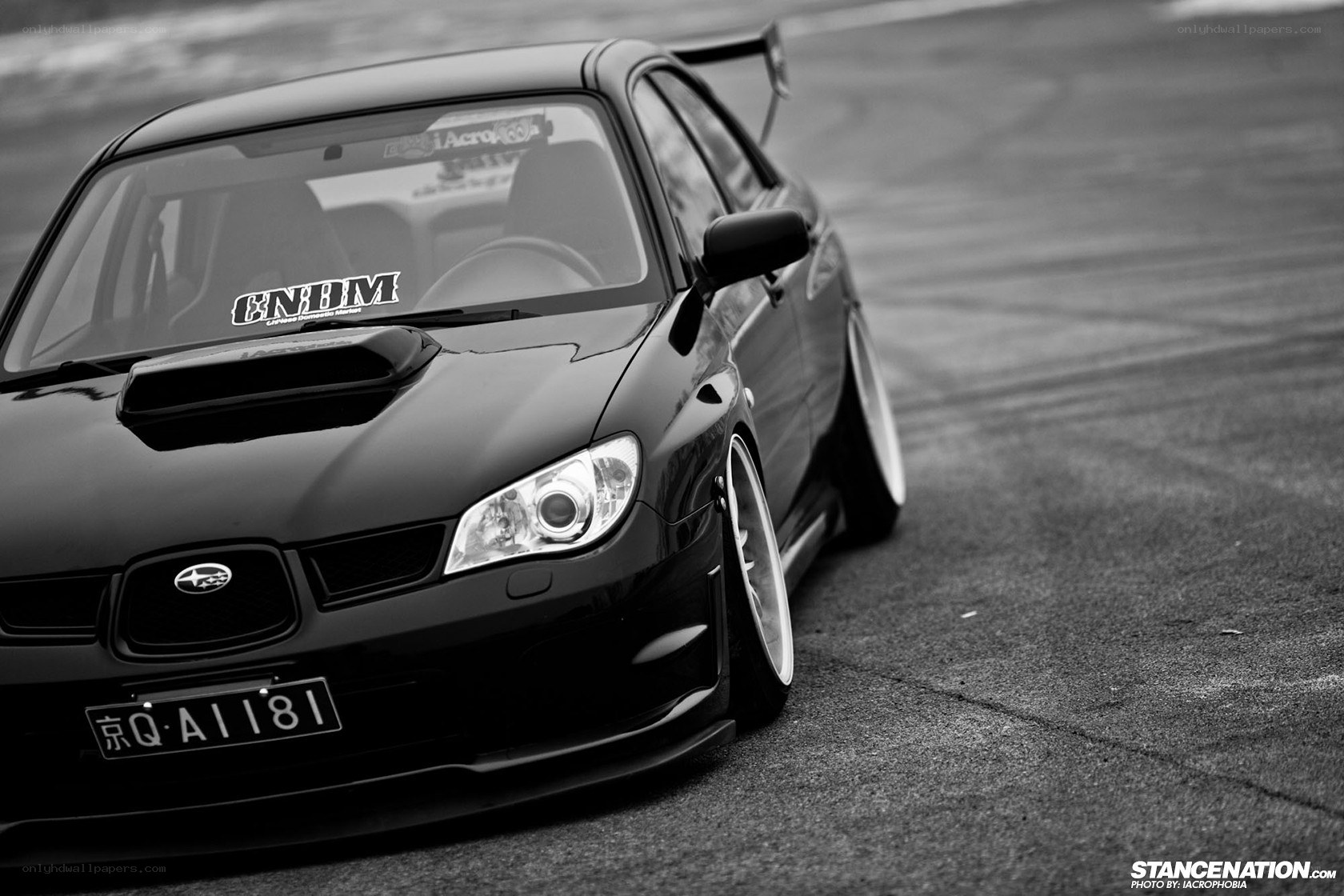 black subaru on a track