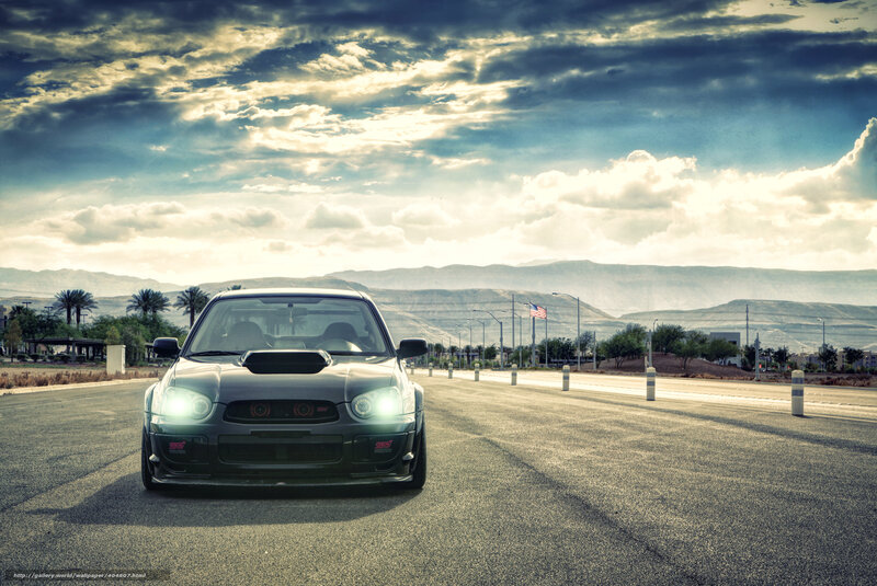 Black Subaru on Road