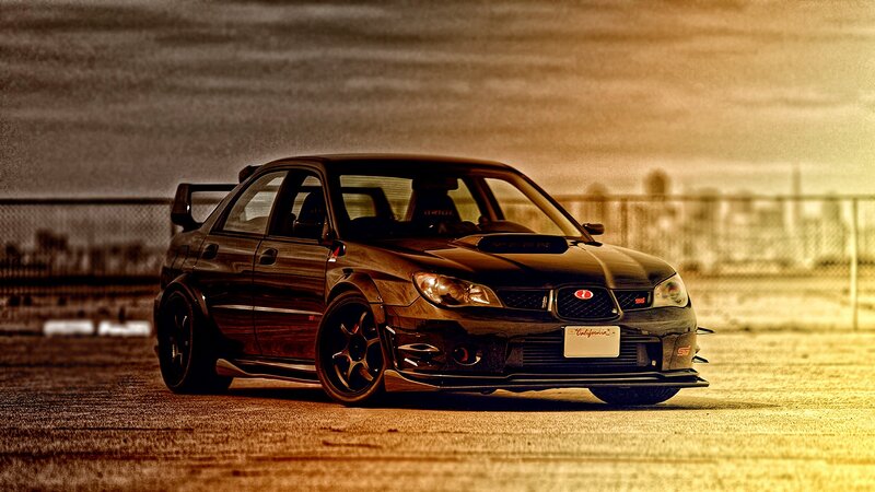 black subaru on track