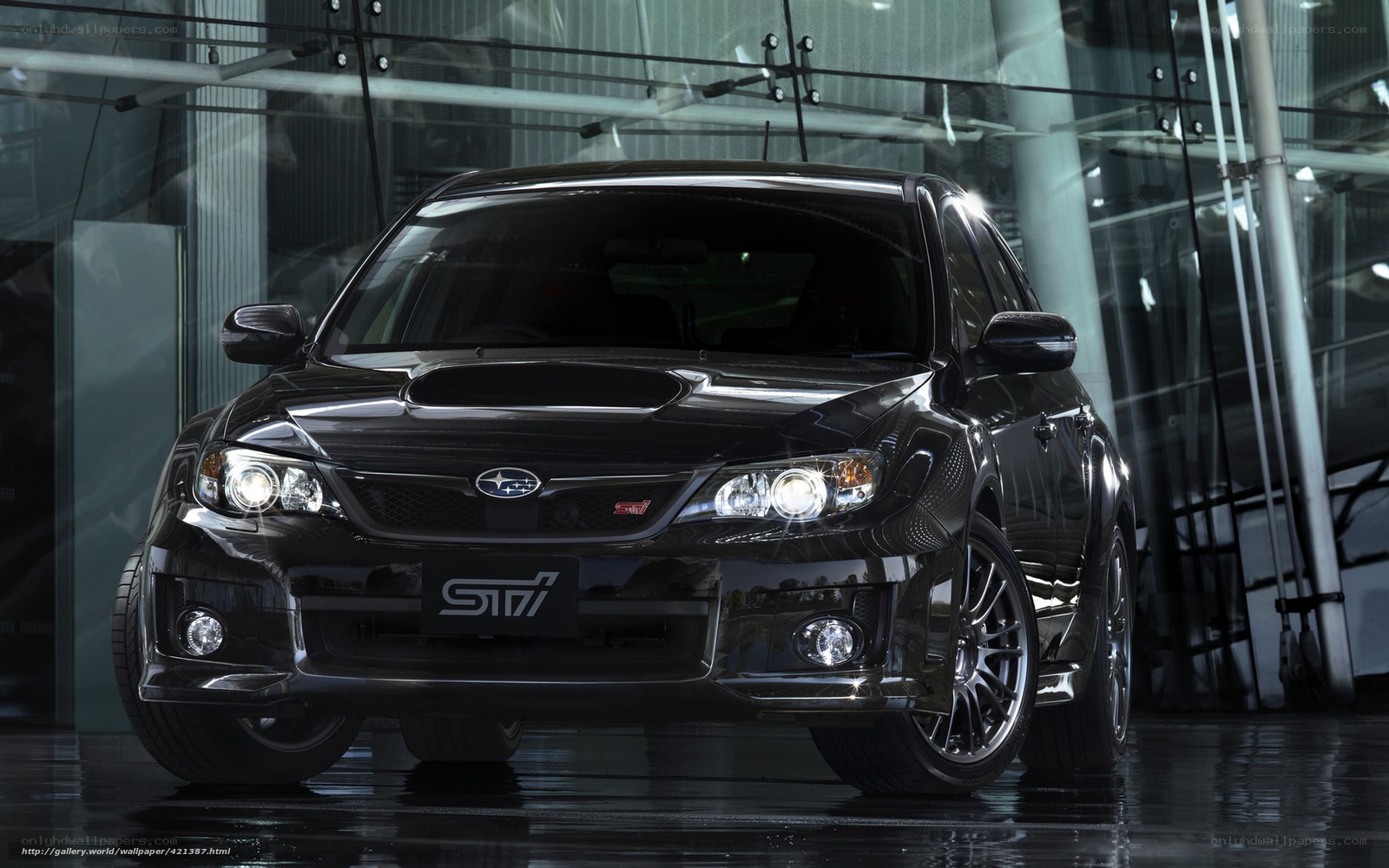 Black Subaru STI in showroom