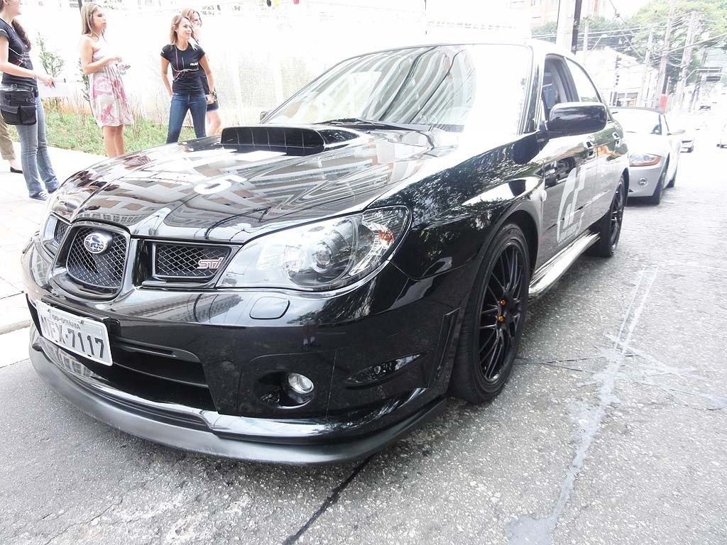Black Subaru STI on display