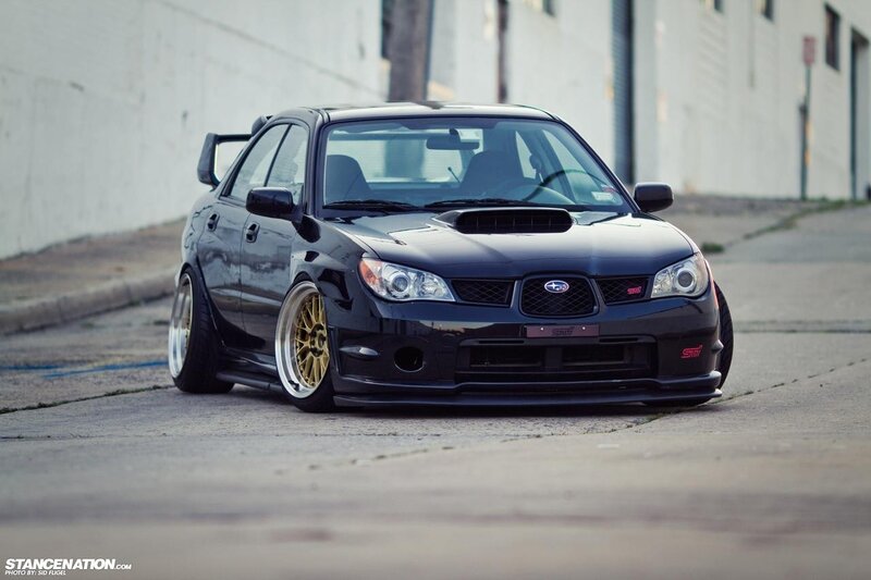 black subaru sti on street