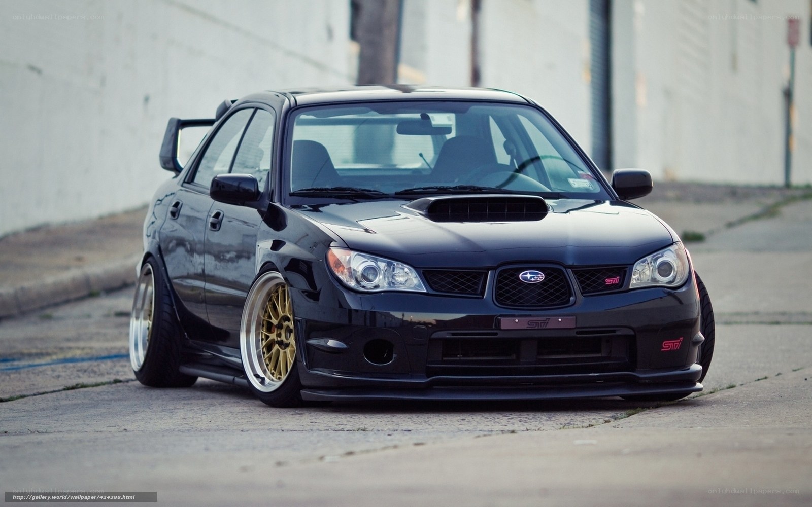 black subaru sti on street