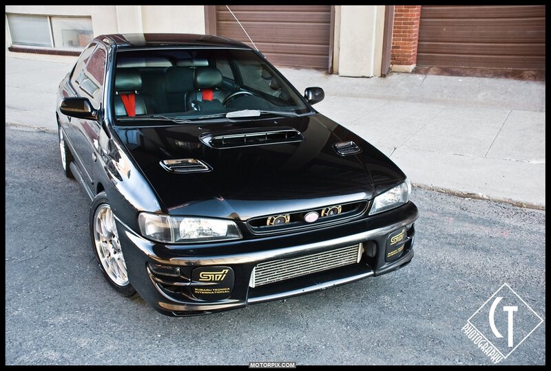 black subaru sti performance car