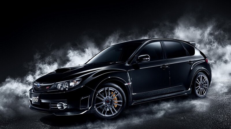 Black Subaru STI with smoke