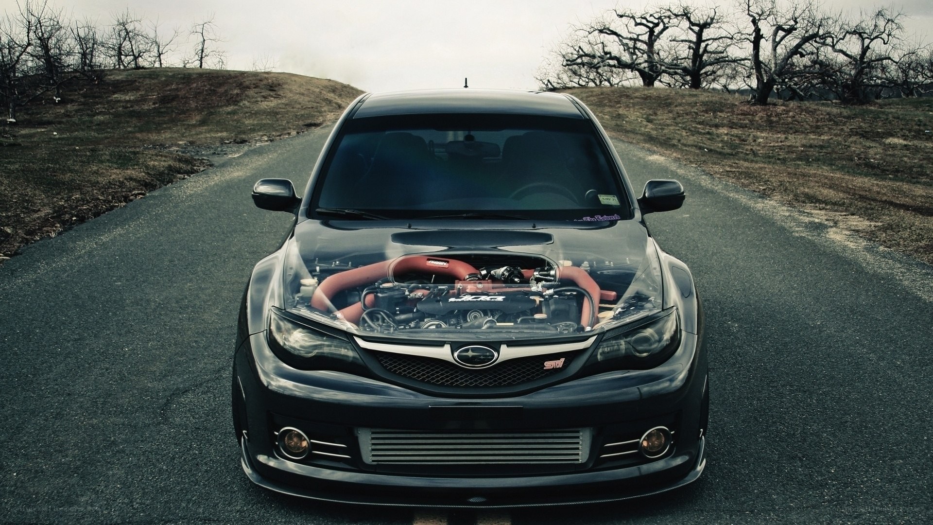 black subaru with open hood