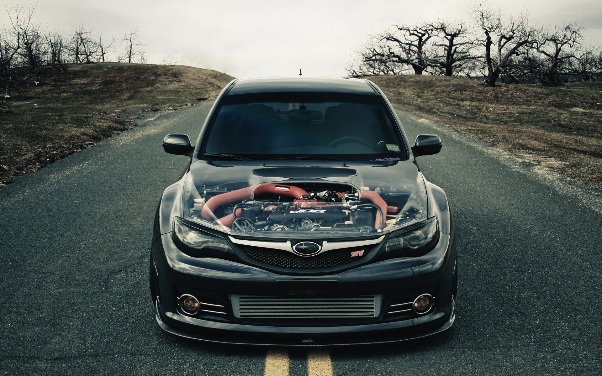 black subaru with open hood