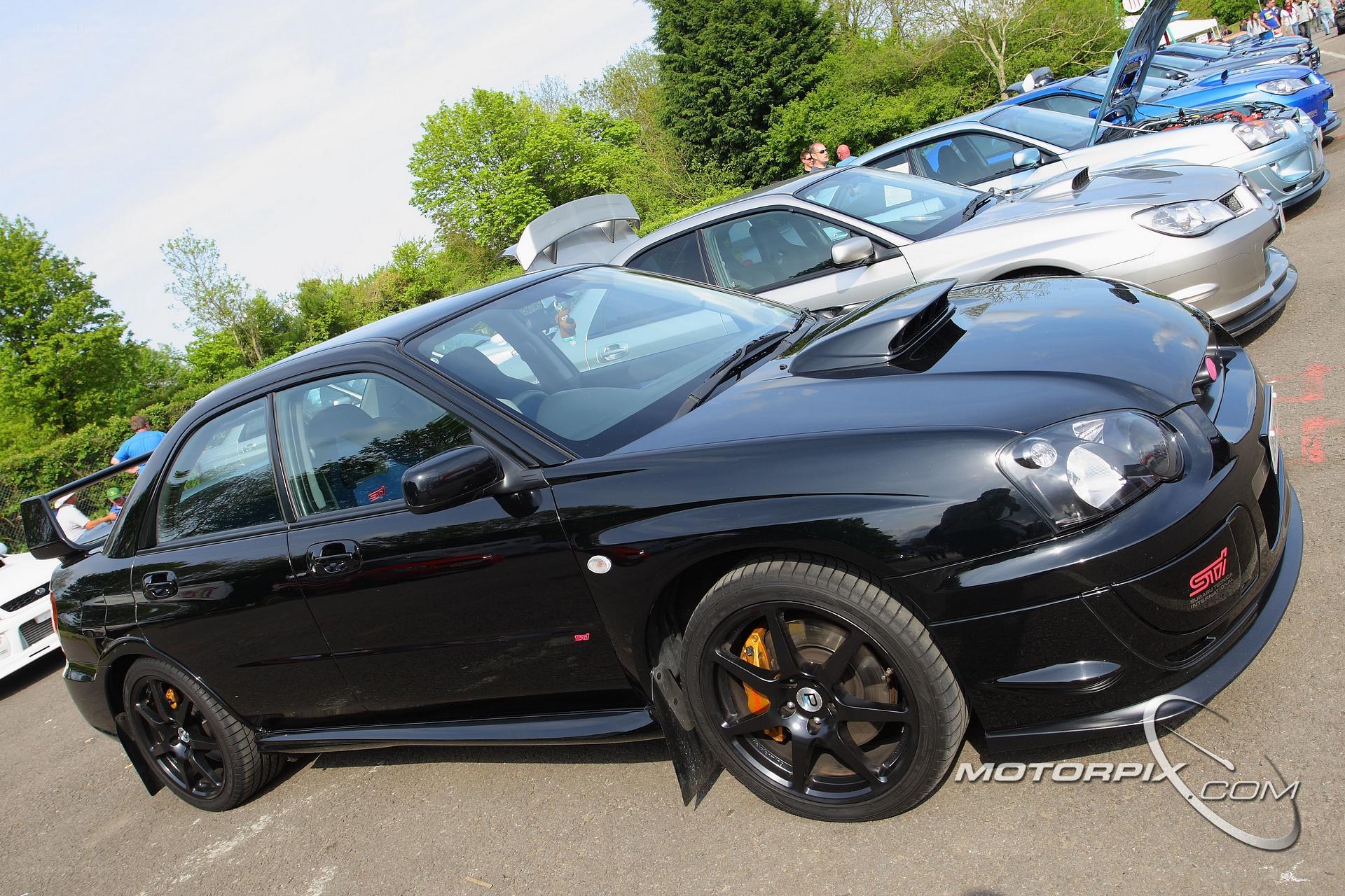 Black Subaru WRX at car show