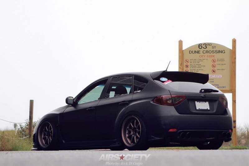 Black Subaru WRX at Dune Crossing