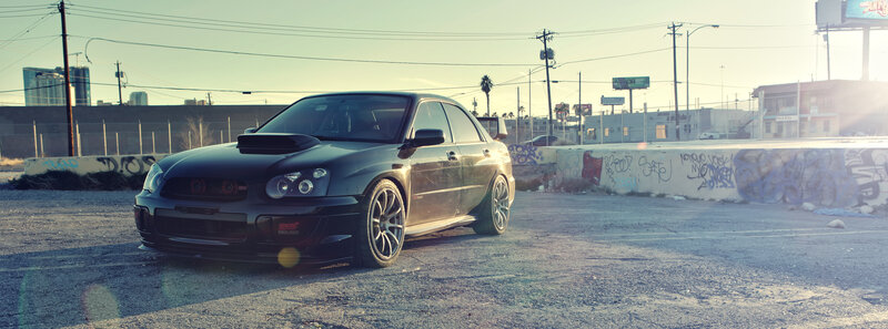 Black Subaru Wrx Sti — Dramatic, Sunset, Photograph, Graffiti Wall