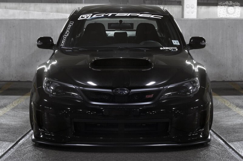 black subaru wrx sti front view