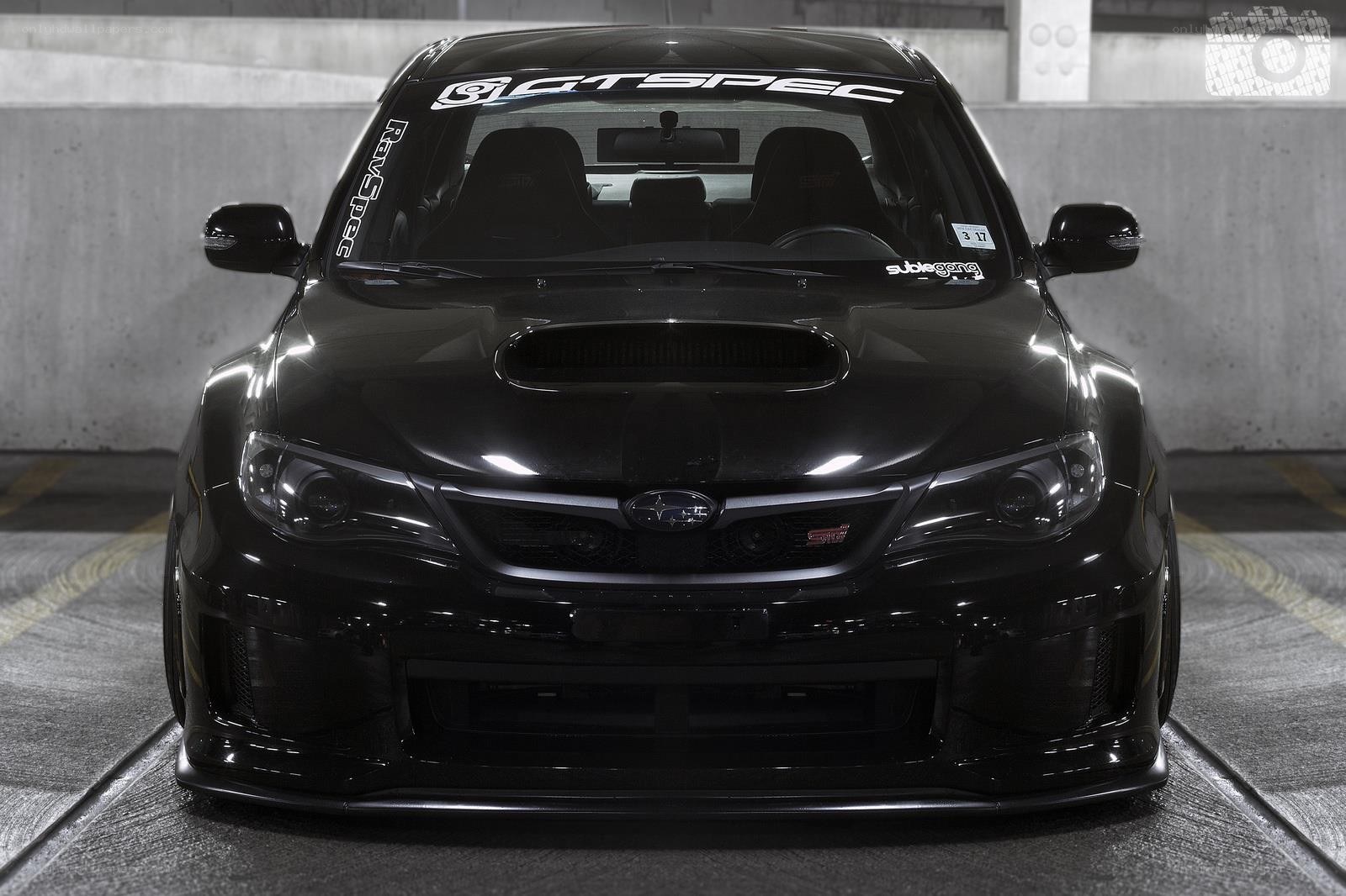 black subaru wrx sti front view