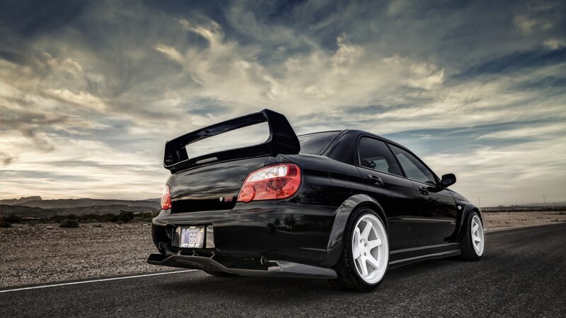 black subaru wrx sti on desert road