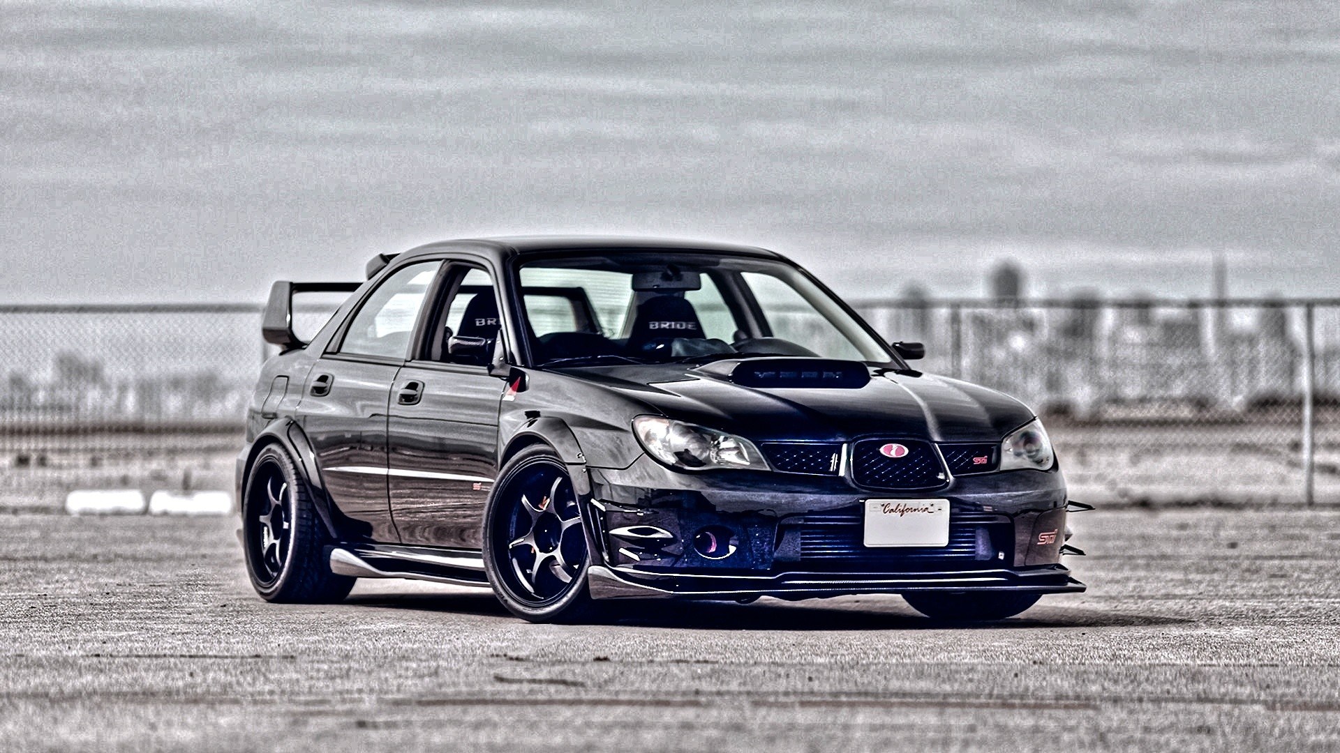 black subaru wrx sti on track