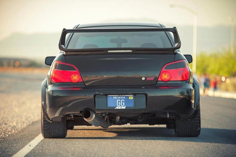 black subaru wrx sti rear view