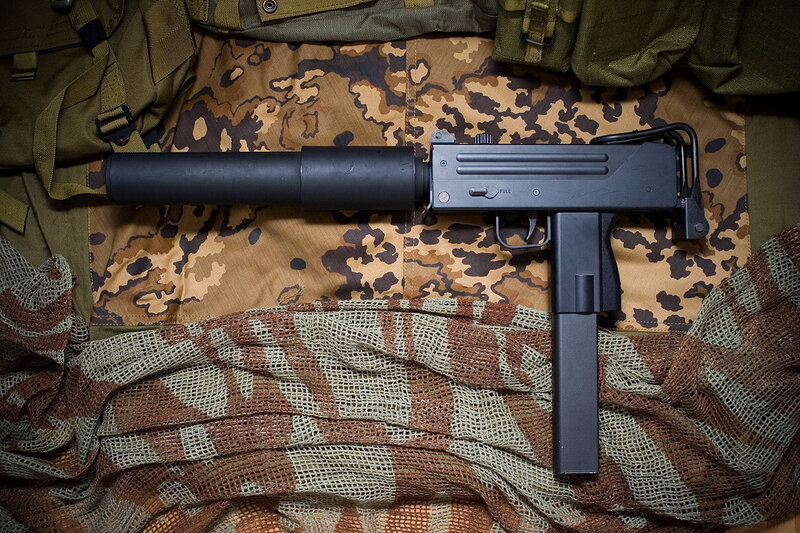 Black Submachine Gun — Neutral, Photograph, Camouflage Fabric