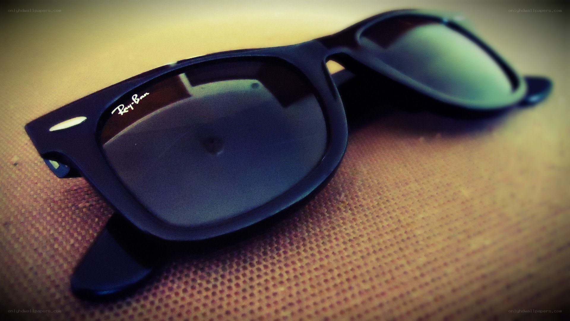 black sunglasses on fabric