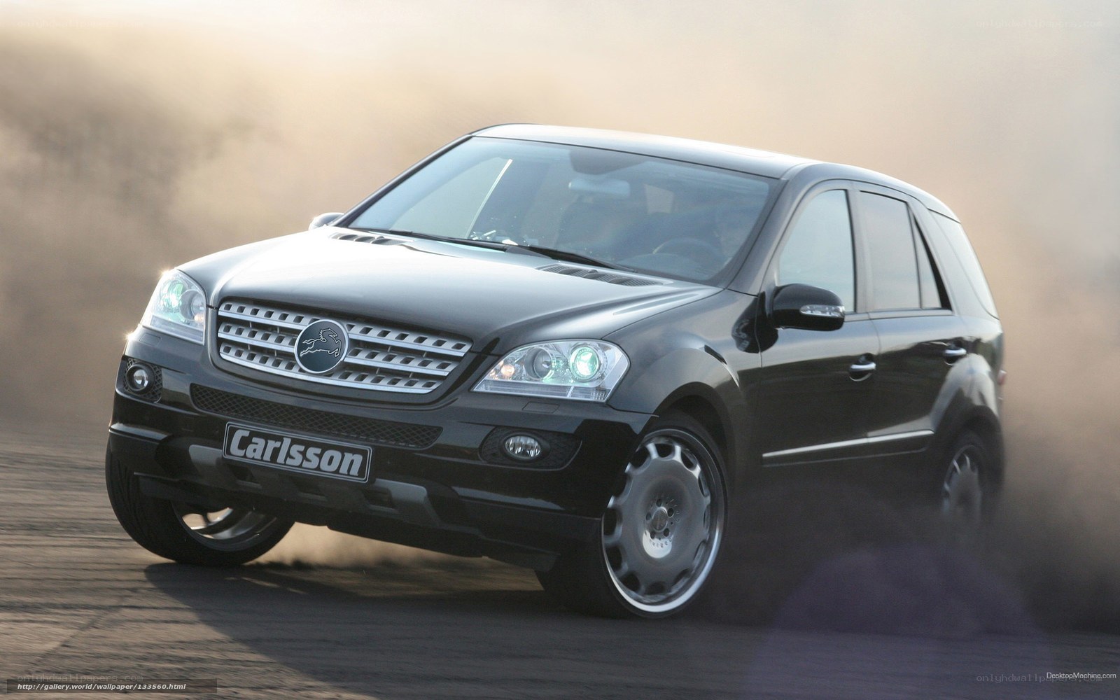 black suv drifting on track